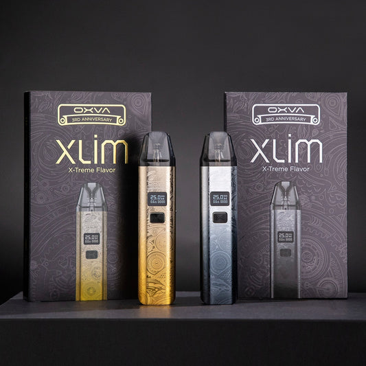 OXVA XLIM 3rd Anniversary vape kits in gold and silver designs.