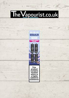 SKE Crystal 4 in 1 Blue Edition Pods 4 Pack with berry and beverage-inspired flavours, displayed in retail packaging on wooden background.