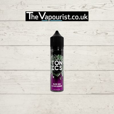 Tonics Sloe Gin & Cucumber 50ml vape juice with sloe berries and cucumber flavor, displayed against a rustic white wooden background.