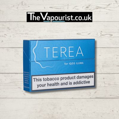 IQOS TEREA Blue - Menthol Sticks packaging for IQOS Iluma, offering crisp, clean vaping with reduced smoke and odor. Displayed on wood background.