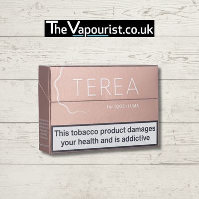 IQOS TEREA Teak toasted tobacco vape sticks for IQOS Iluma, shown in sleek rose-gold packaging with health warning label on front.
