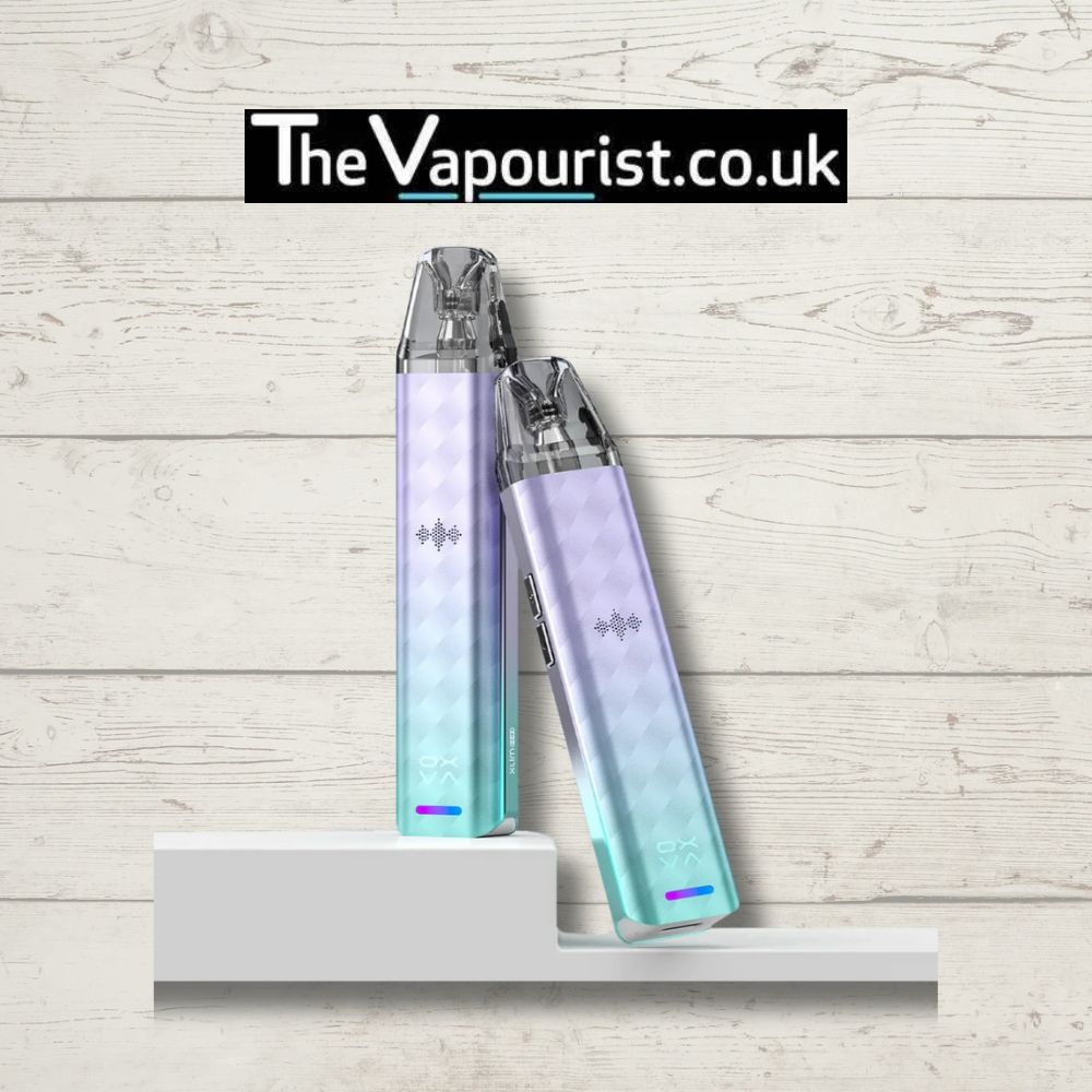 OXVA Xlim SE2 Pod Kit in gradient purple and teal finish, featuring sleek ergonomic design and smart LED indicators, displayed on a white shelf.