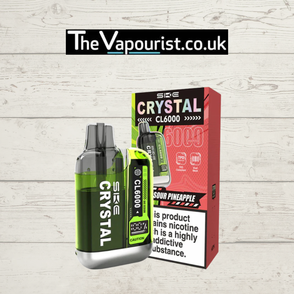 SKE Crystal CL6000 Prefilled Pod Kit Sour Pineapple with green vape device and red retail box, ideal for long-lasting flavour and convenience.