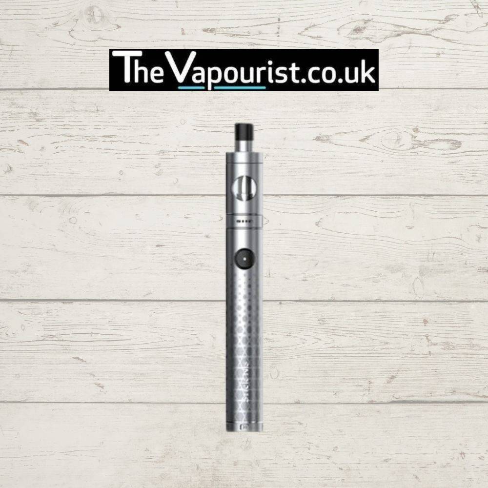 SMOK Stick N18 Kit in silver finish featuring a 1300mAh battery, shown upright against a whitewashed wood backdrop. Sleek and user-friendly vape device.