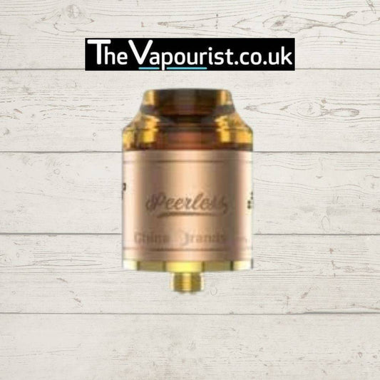 GEEKVAPE Peerless RDA in gold finish, designed for exceptional flavour and cloud production, available at The Vapourist.co.uk.