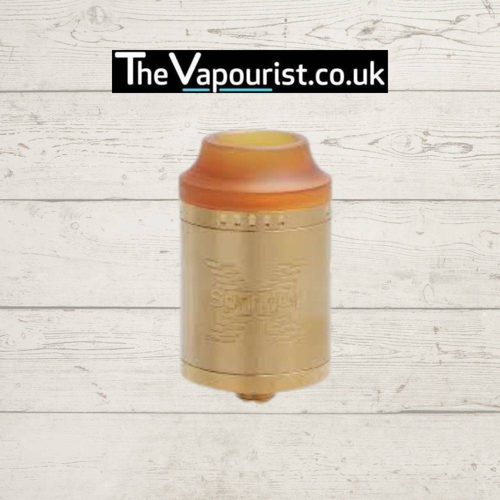 Gold Tigertek Springer X RDA with spring-loaded clamp deck and Ultem drip tip, designed for advanced vapers seeking premium performance.
