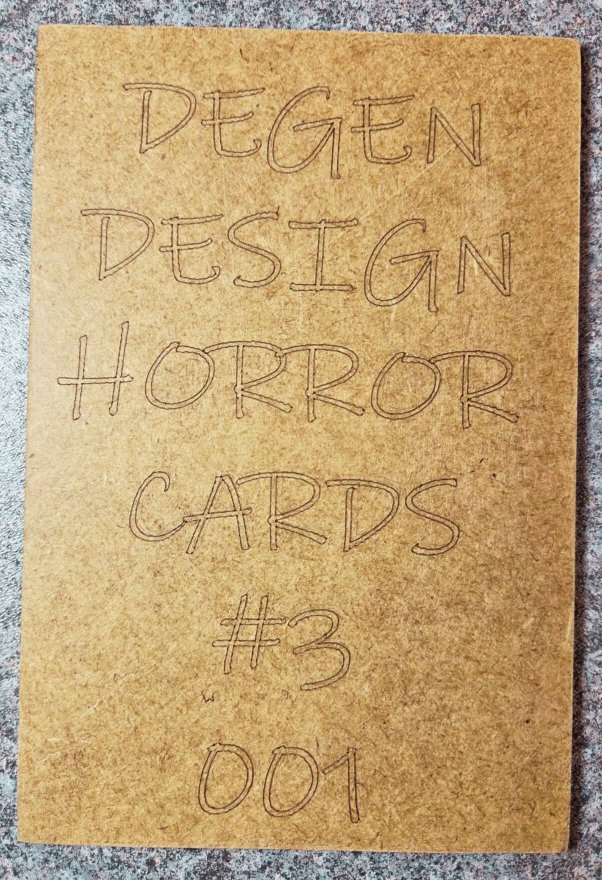 Back of Degen Design Card #3 - John Wayne Gacy Collector shows hand-etched text on wood, marking it as horror card #3, limited edition 001.