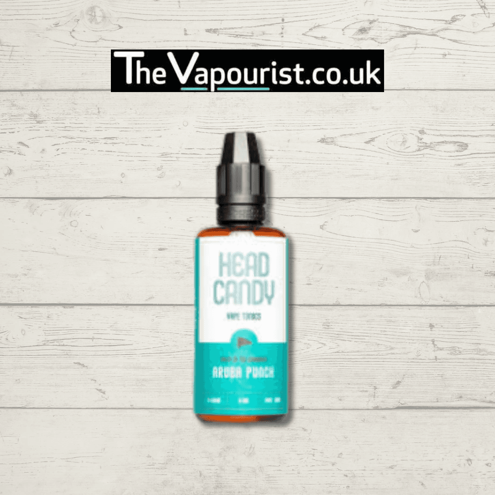 Head Candy Cola Short Fill - Artisan 50ml e-liquid bottle with teal and white label, showcased on wooden background for cola vape lovers.