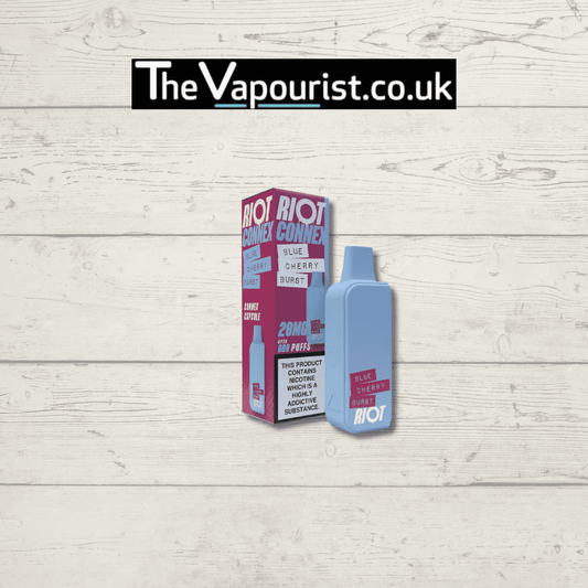 Riot Connex Pod - Blue Cherry Burst Vape with 600 puffs and 20mg nic salt, shown with branded packaging on a wooden background.