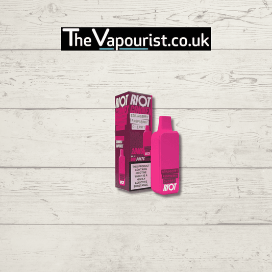 Riot Connex Berry Pod 20mg in Strawberry Raspberry Cherry flavor with 600 puffs, displayed with branded packaging on wood background.