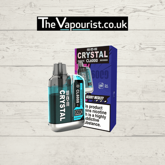 SKE Crystal CL6000 Prefilled Pod Kit Berry Medley with sleek blue design and packaging, offering up to 6000 puffs of fruity vape flavour.