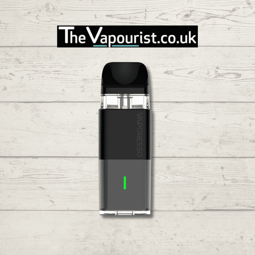 Vaporesso XROS Cube Pod Kit in black with 900mAh battery and leak-resistant design, displayed on wood background for TheVapourist.co.uk.