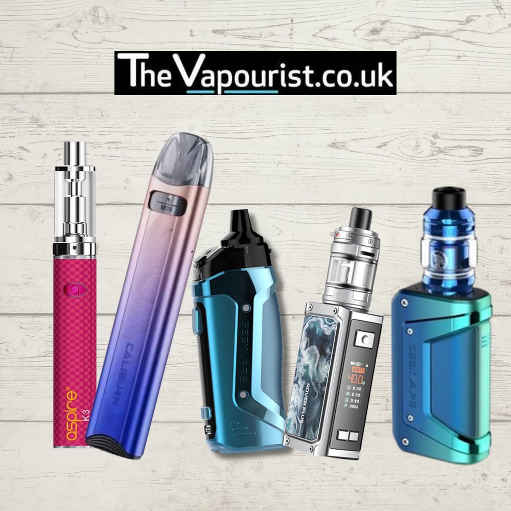 Colorful vape kits from The Vapourist.co.uk on wooden background.